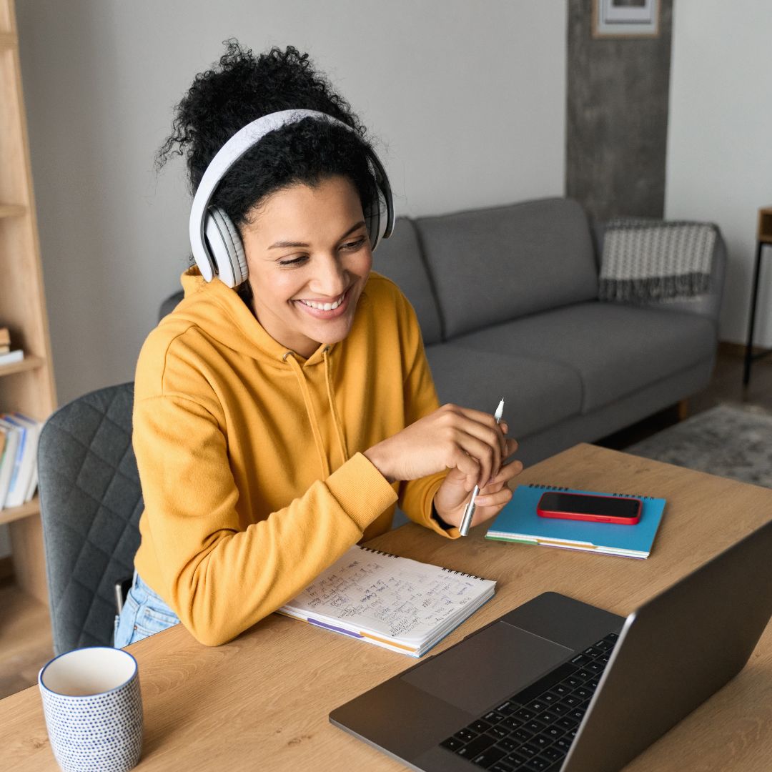 Woman talking through a video call on her computer